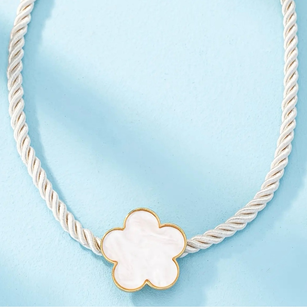 White big clover pendant on a thick twisted white cord design. - Picture 3 of 3